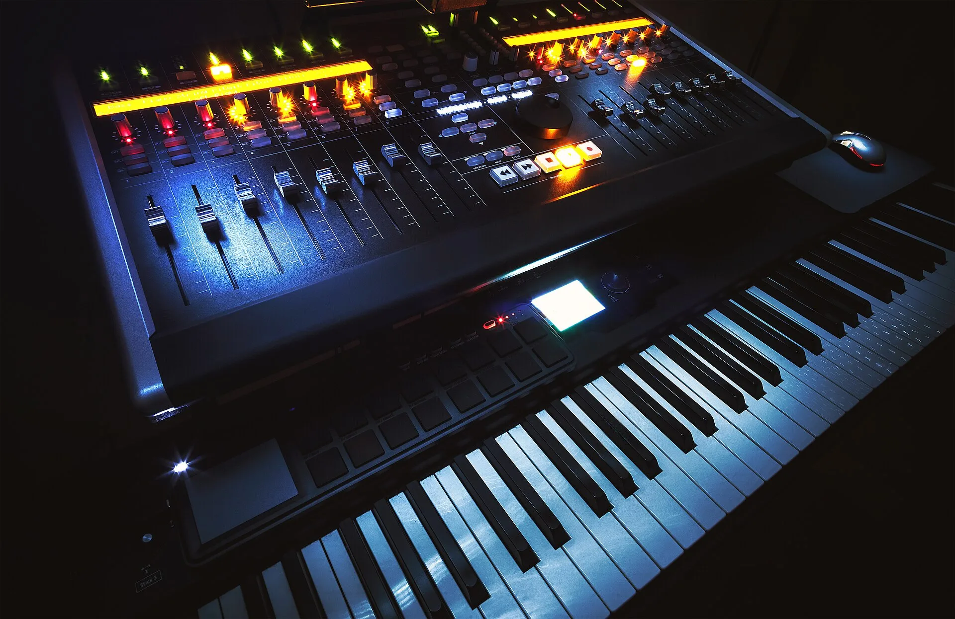 Closeup view on small modern home music studio, keyboard, mixing console and computer. Music studio trends that move demand in 2027